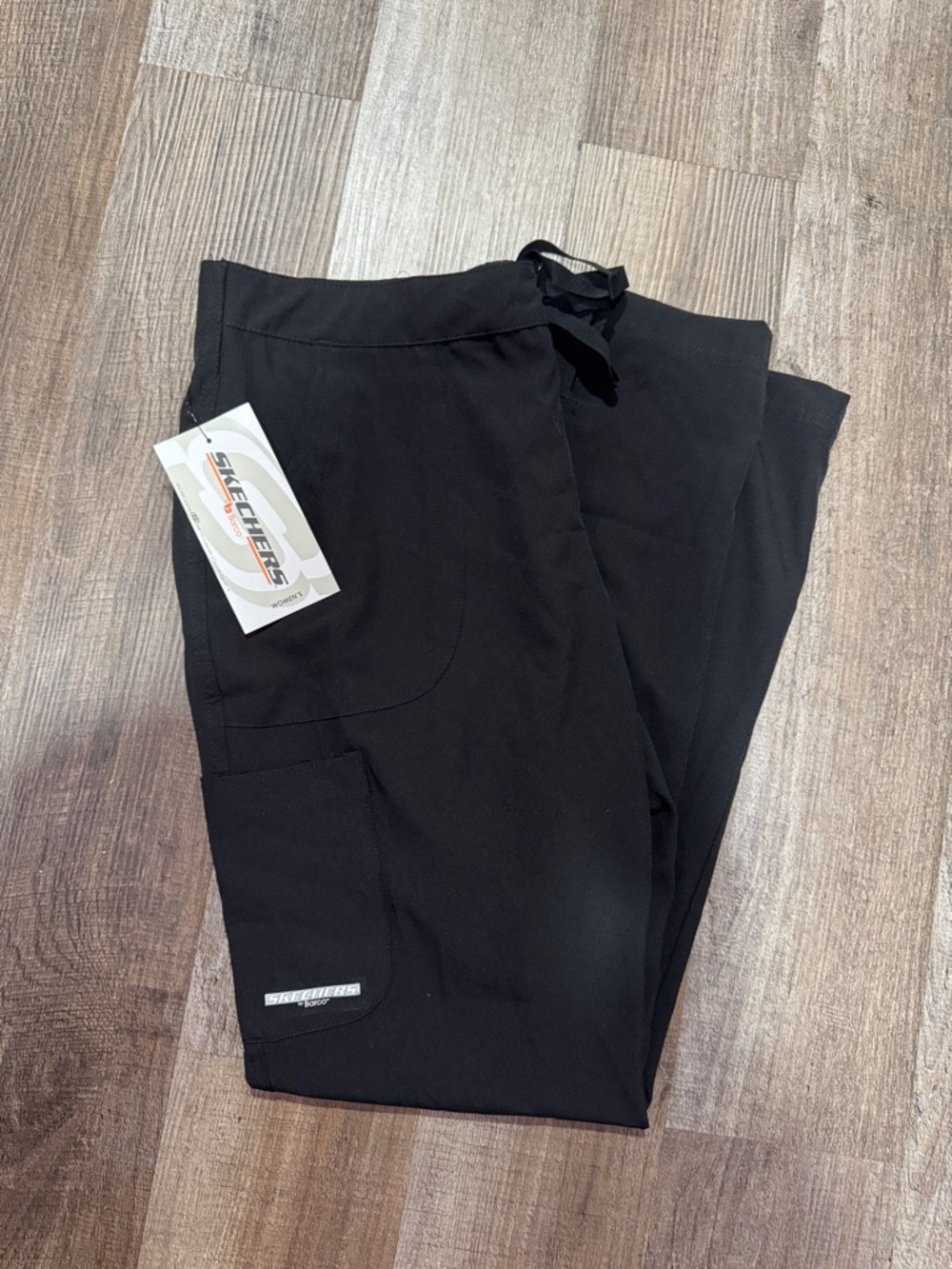 Woman’s black flare scrub pants